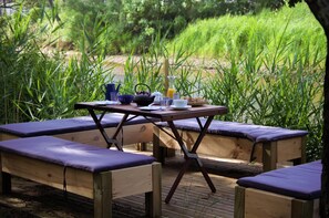 Outdoor dining - Holiday Home “Villa Ananda - Kerala Annex” (Capbreton)