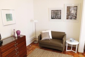 Quarto casal superior | Área de estar