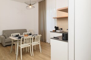 Lejlighed - balkon | Spiseområde