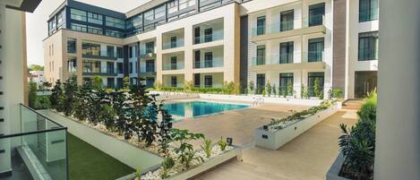 Apartment, 1 Bedroom, Accessible, Smoking | Pool | Outdoor pool