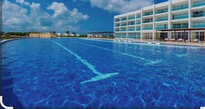 Beautiful apartment with a spectacular view, private beach, and pool