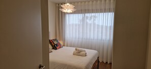 1 habitación, tabla de planchar con plancha, wifi gratis y ropa de cama 