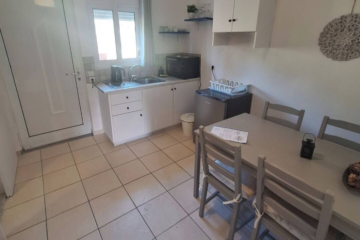 Standard Double Room, City View | Private kitchen