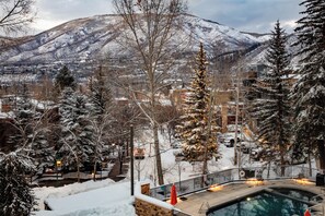 A heated pool - Fifth Avenue Unit 201 | 3BR Luxury Condo with Mountain Views, Walking Distance to Downtown Aspen (Aspen)