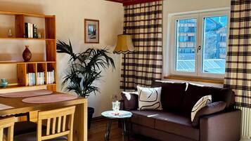 Classic Condo, 1 Bedroom, Balcony, Mountain View | Living area | 50-inch flat-screen TV with cable channels