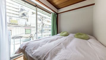 Departamento familiar, balcón, vista a la ciudad | Cortinas blackout, tabla de planchar con plancha y wifi gratis