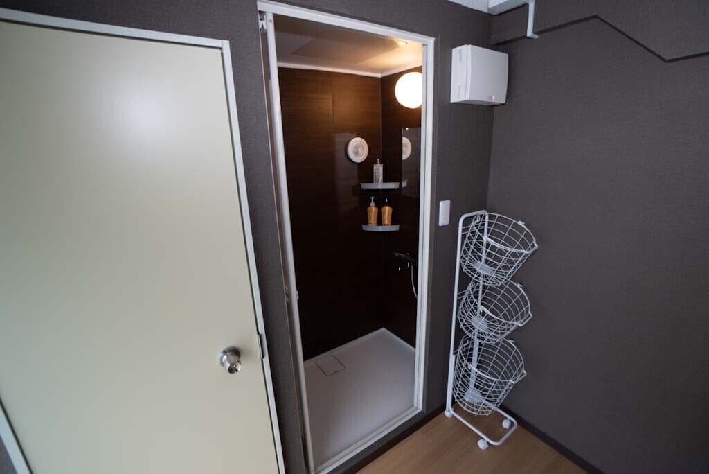Basic Triple Room, Multiple Beds, Balcony, City View | Bathroom | Slippers