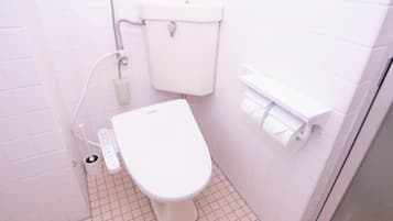 Basic Triple Room, Balcony, City View | Bathroom | Slippers