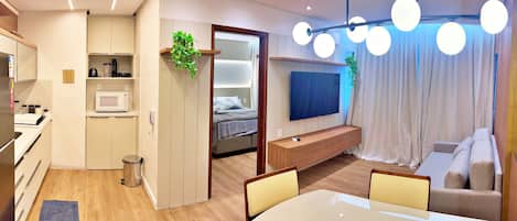 Appartement | Aire de séjour | Téléviseur connecté de 42 po avec chaßnes spécialisées
