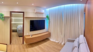 Appartement Confort | Coin séjour | TV connectée de 42 pouces avec chaînes thématiques