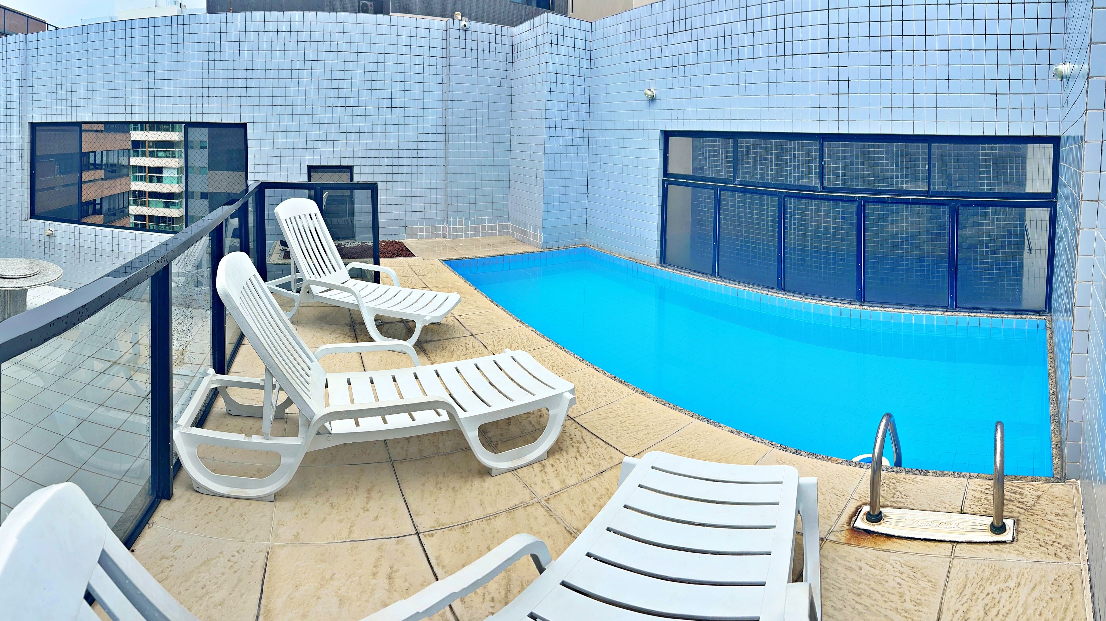 Indoor pool, sun loungers