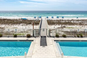 A pool with a view of the beach and ocean. - Stunning and Spacious Gulf Front Blu 204 - Free Beach for 2 (Fort Walton Beach)