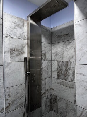 Shower, hair dryer, towels, soap