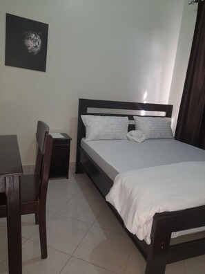 Double or Twin Room | Laptop workspace - Origin Ventures Hostel (Moshi)