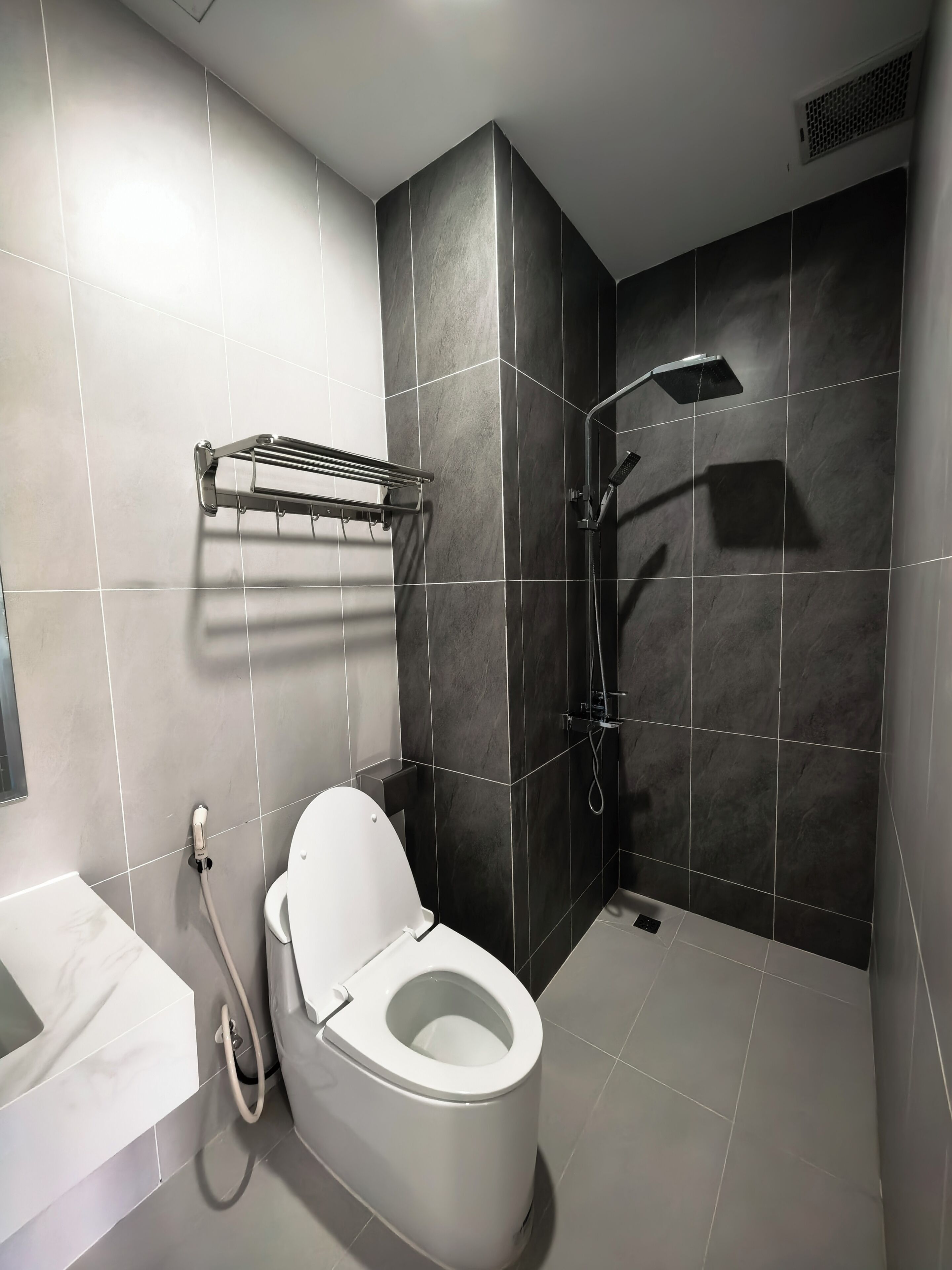 Shower, free toiletries, hair dryer, slippers