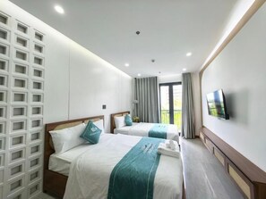 Deluxe kamer, uitzicht op de stad | Gratis wifi, beddengoed