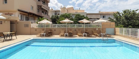Seasonal outdoor pool, open 9:00 AM to 6:30 PM, sun loungers