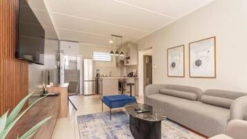 Departamento de lujo, aire acondicionado | Área de sala de estar