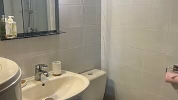 Hair dryer, towels, soap, toilet paper