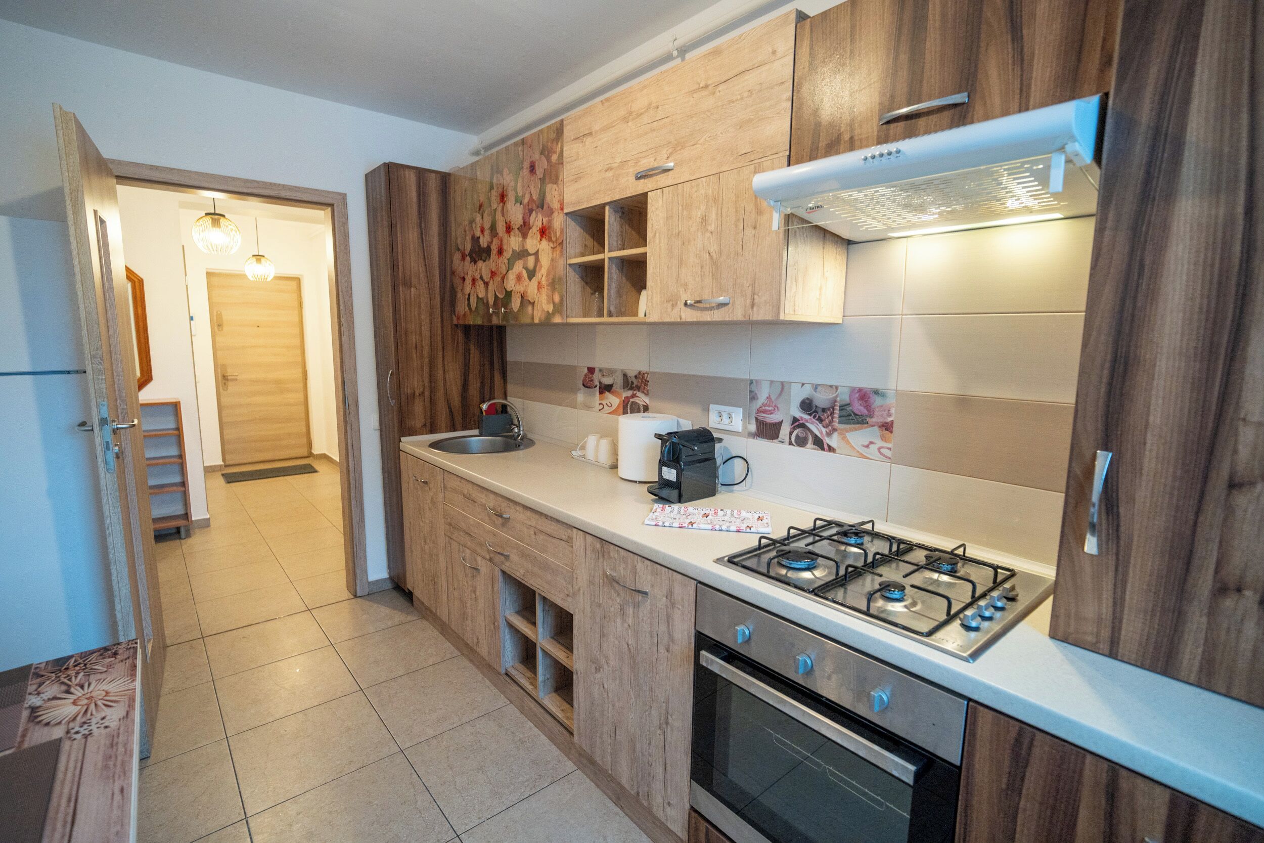 Full-sized fridge, oven, stovetop, cookware/dishes/utensils