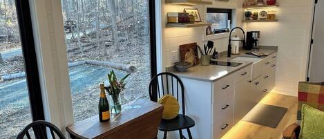 Fridge, microwave, stovetop, coffee/tea maker