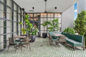 Outdoor dining - Limoncello Spritz- Central Miami, Pool, Gym, Spa (Miami)