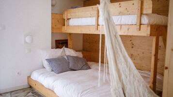 Premium bedding, memory-foam beds, iron/ironing board, free WiFi