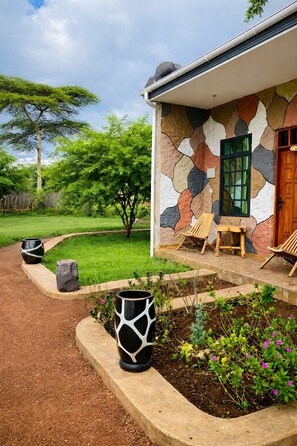 Kamar Double Deluks, pemandangan kebun | Teras/patio