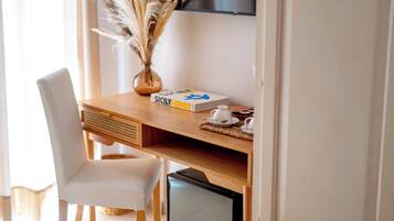 Free minibar, in-room safe, laptop workspace, blackout drapes