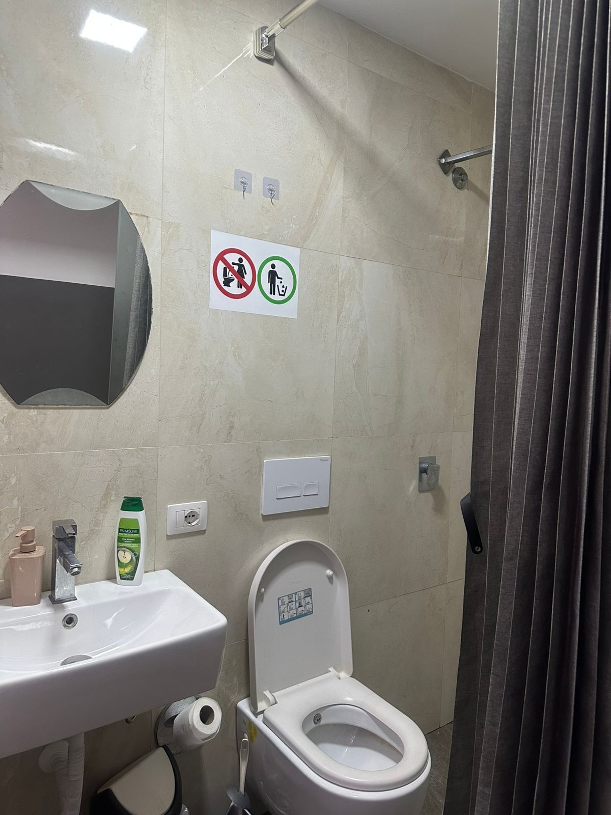 Shower, hair dryer, towels, shampoo