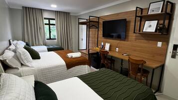 Premium Triple Room | Laptop workspace, blackout drapes, iron/ironing board, free WiFi