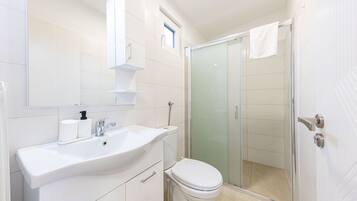 Shower, towels, soap, shampoo