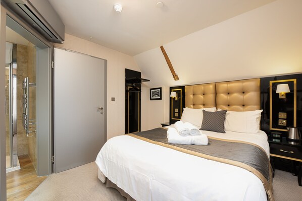 In-room safe, desk, laptop workspace, blackout curtains