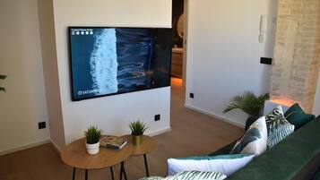 Apartemen Superior, pemandangan gunung | Area keluarga | TV layar datar