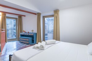 Fer et planche à repasser, draps fournis