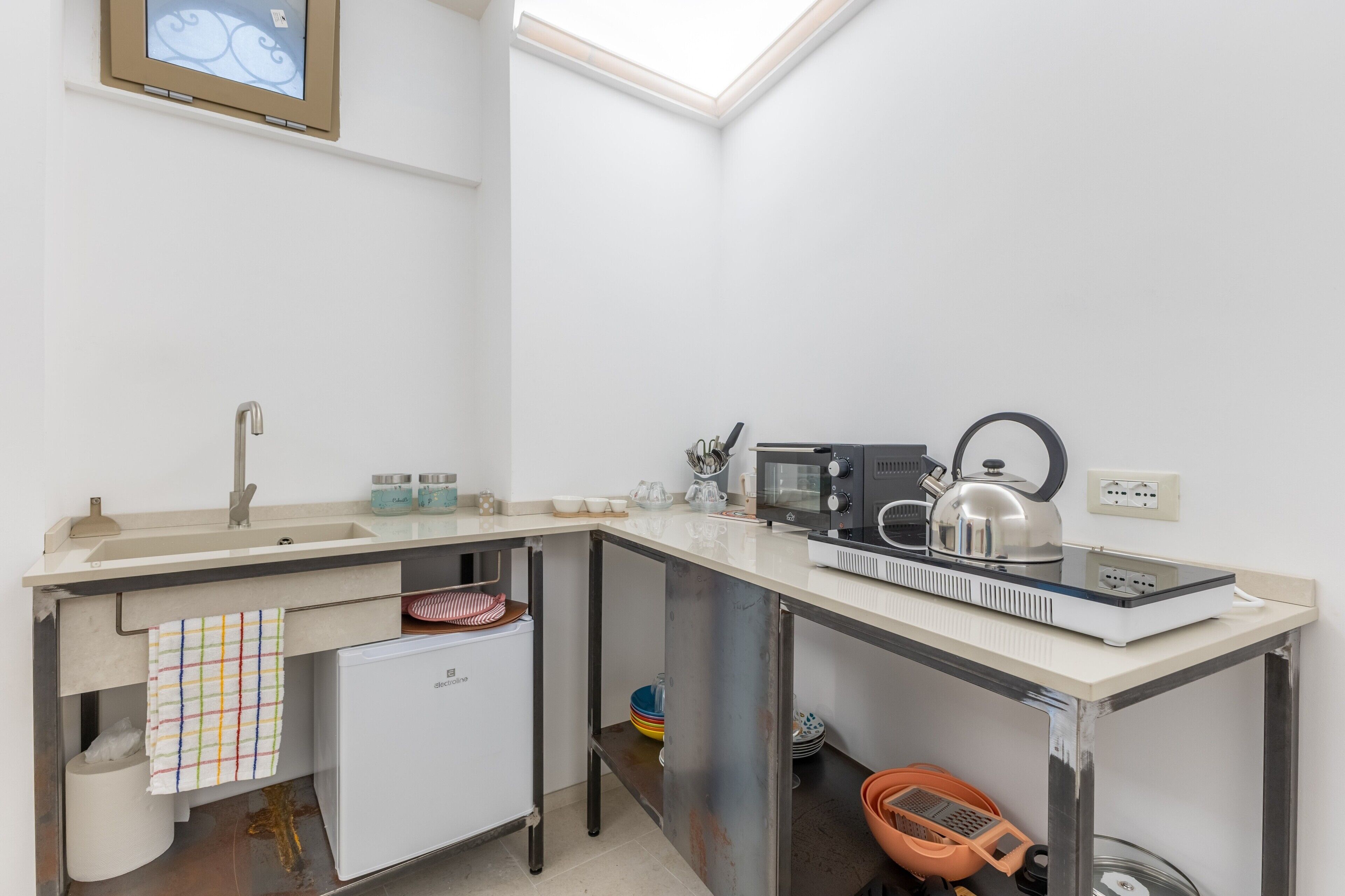 Fridge, stovetop, high chair, cookware/dishes/utensils