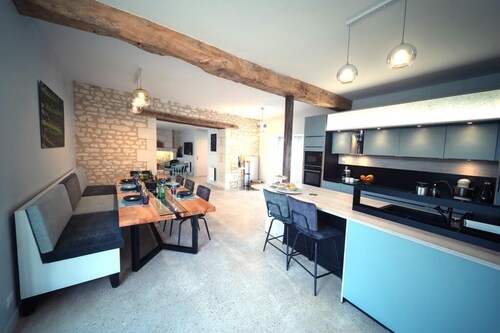 Retreat to a serene, elegant haven amid greenery, just minutes from Chinon.