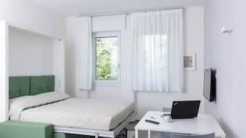 Desk, blackout drapes, iron/ironing board, free WiFi