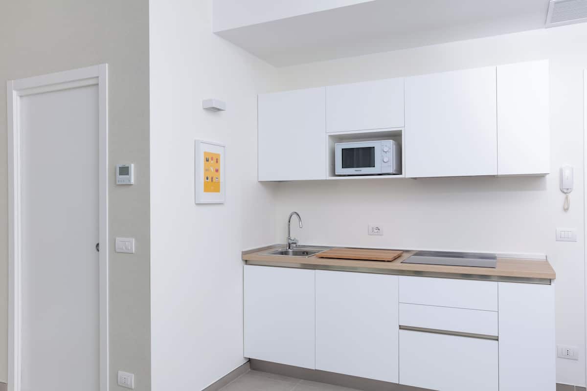 Chambre Triple Deluxe | Cuisine privée