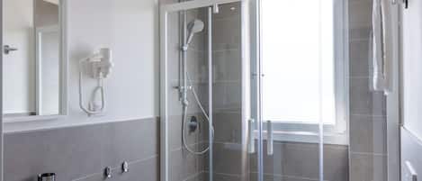 Hair dryer, towels, soap, shampoo