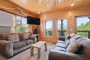 Living area - NEW! LUXE, Clean & Stocked Cabin w/Hot Tub & Stunning Men Views in Wears Valley. (Sevierville)
