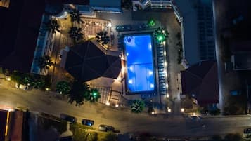 Seasonal outdoor pool, pool umbrellas, pool loungers