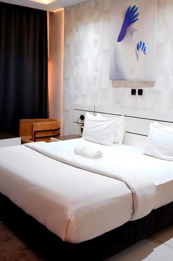 Suite Deluxe | Fer et planche à repasser, Wi-Fi gratuit