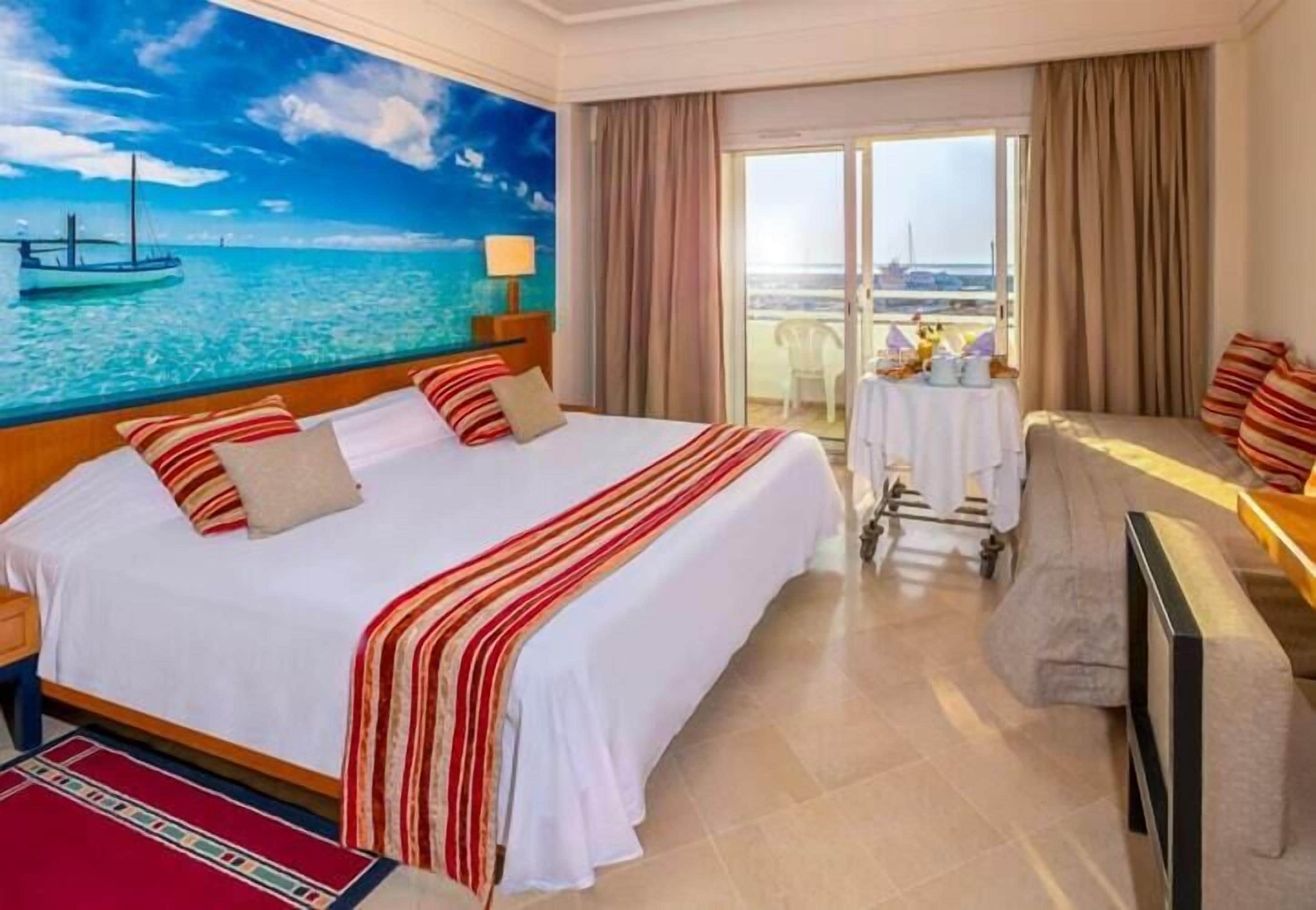 Chambre Quadruple, balcon, vue jardin | Chambres insonorisées, Wi-Fi gratuit, draps fournis