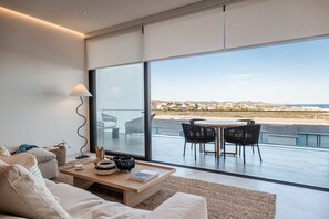 TV, fireplace - Cora Sunset: Brand New Oceanview 3BR Near Golf, Pool & Swimmable/Surfable Beach (San José del Cabo)