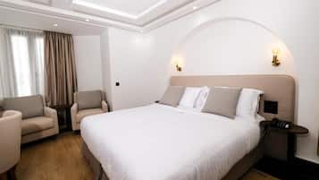 Deluxe Double Room, City View | Minibar, in-room safe, iron/ironing board, free cribs/infant beds