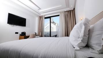 Minibar, coffres-forts dans les chambres, fer et planche Ă repasser