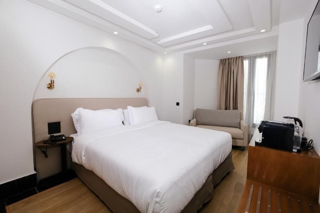 Family Suite, City View | Minibar, in-room safe, iron/ironing board, free cribs/infant beds