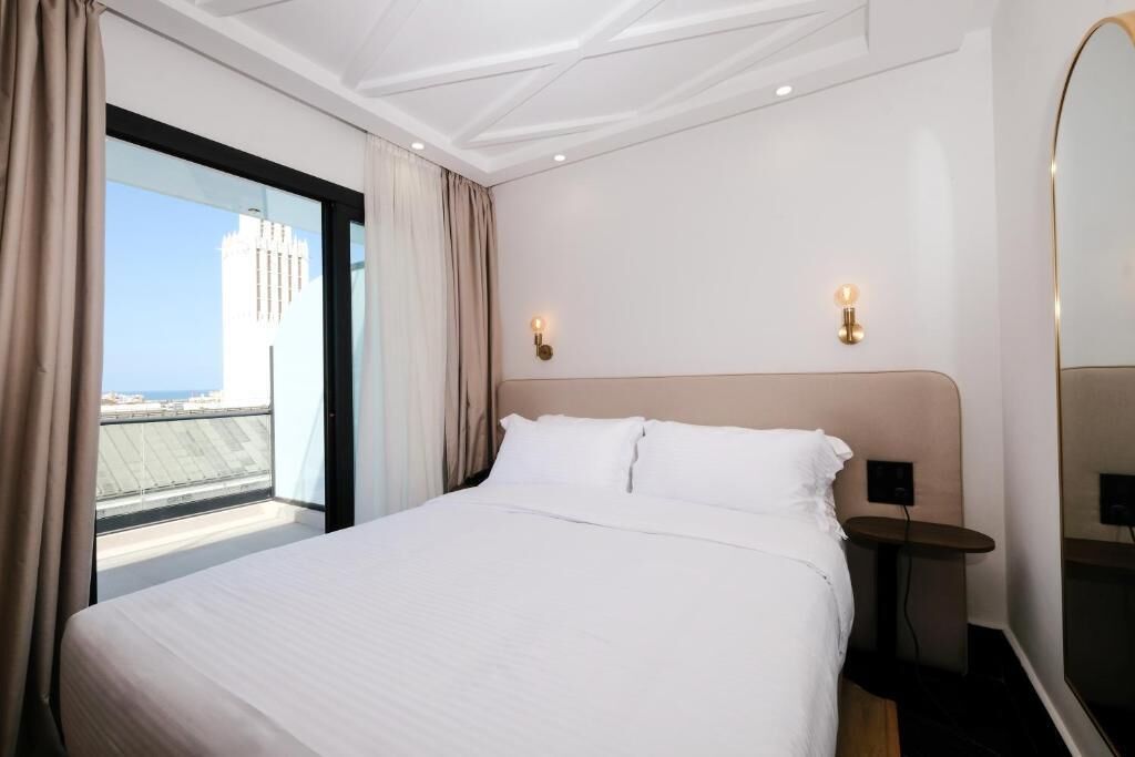 Coffres-forts dans les chambres, fer et planche à repasser