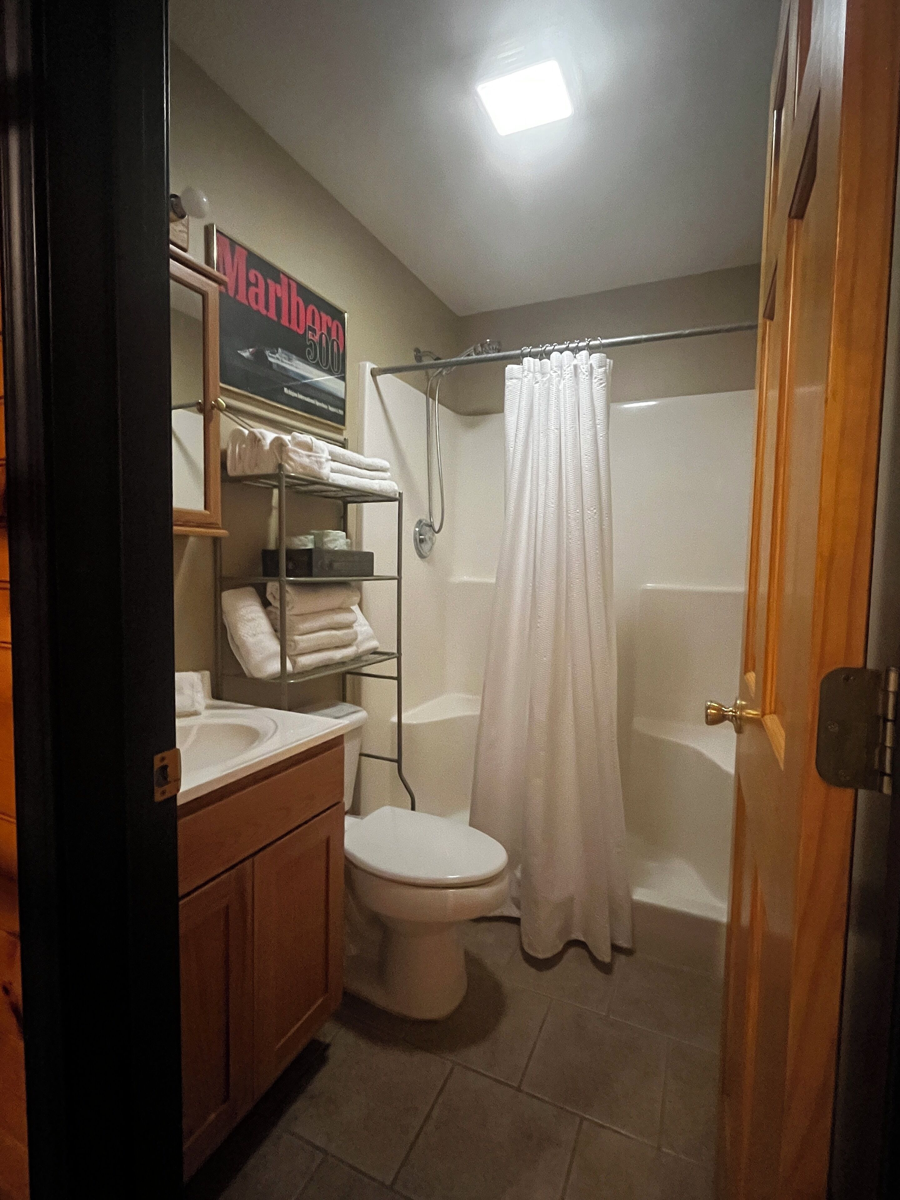 Shower, towels, soap, toilet paper